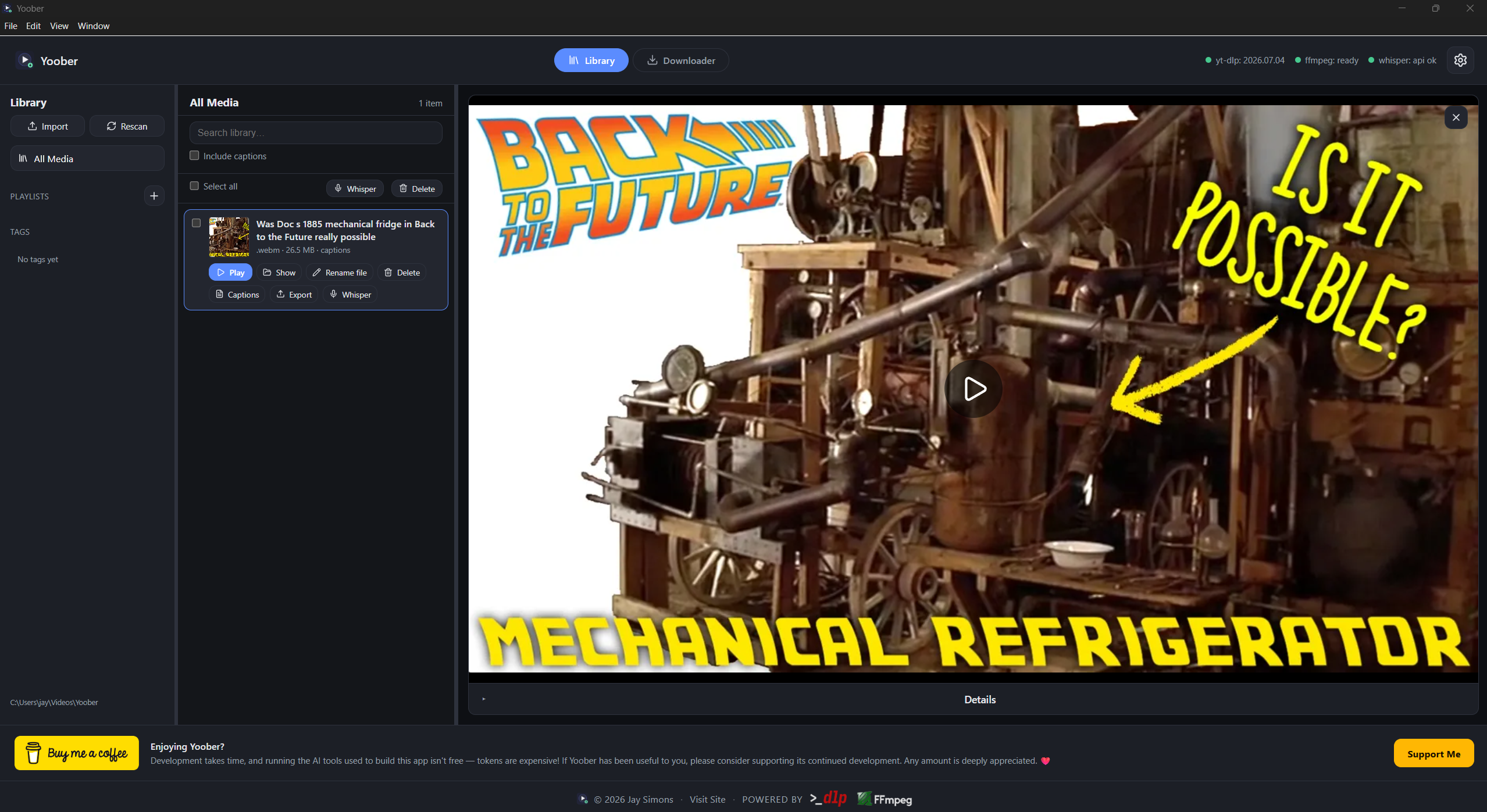 Yoober desktop app on Windows showing the Library view with a downloaded video, caption actions, bundled yt-dlp and ffmpeg status, and an in-app preview player